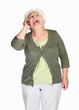 Laughing mature woman over cell phone isolated against white