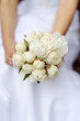 Bride holding beautiful wedding bouquet