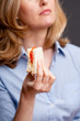 Holding a sandwich