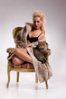 Young Beautiful Woman In Fur Coat