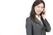 スマートフォンをかける女性社員