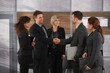 Smiling businessmen shaking hands