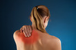 Woman massaging pain back Woman massaging pain back