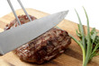 roasted meat on a cutting board. isolated object roasted meat on a cutting board. isolated object