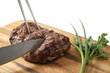roasted meat on a cutting board. isolated object roasted meat on a cutting board. isolated object