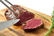 roasted meat on a cutting board. isolated object roasted meat on a cutting board. isolated object