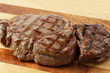 roasted meat on a cutting board. isolated object roasted meat on a cutting board. isolated object