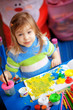 Little girl painting