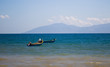 2 fishing boats floating at sea 2 fishing boats floating at sea