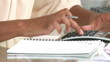 close-up of an african woman using a calculator