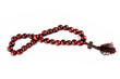 Christian wooden rosary on a white background