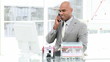 Video: assertive african men on phone in his office assertive african men on phone in his office