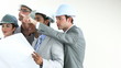 intenational architects studying blueprints