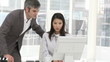 men helping his colleague in their office