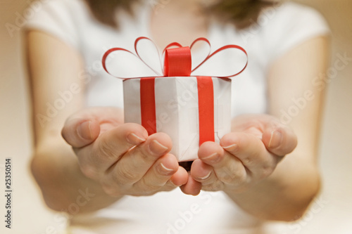 Photo: Time gifts - gift box in hand girls Time gifts - gift box in hand girls