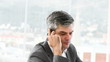 worried business man on phone