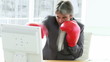 animated Ceo punching his computer sitting in his office