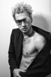 BW portrait of handsome blond man in sunglasses