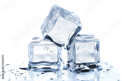 Photo: Three melting ice cubes Three melting ice cubes