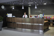 smiling businesswoman at the reception desk
