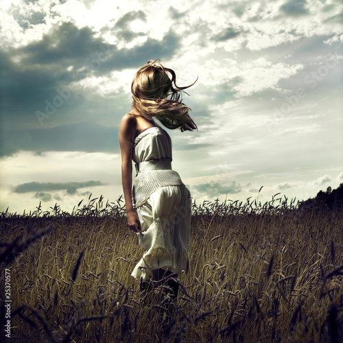 Photo: Jump women in wheat field Jump women in wheat field