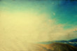 Cloudy blue sky upon green mountain ridge Cloudy blue sky upon green mountain ridge