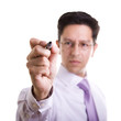 Foto: businessman writing at a whiteboard businessman writing at a whiteboard