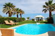 Swimming pool with jacuzzi at the beach of modern luxury villa,