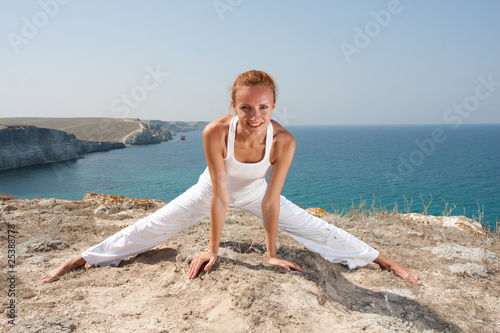 Photo: Woman practices Yoga Woman practices Yoga