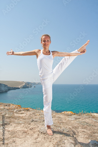 Photo: Woman practices Yoga Woman practices Yoga