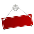 Red label on a nail.
