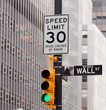 Wall Street road sign in the corner of New York Stock Exchange Wall Street road sign in the corner of New York Stock Exchange