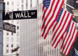 Wall Street road sign in the corner of New York Stock Exchange Wall Street road sign in the corner of New York Stock Exchange