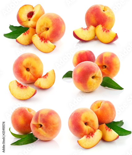 Photo: set fresh peach fruits with green leaves set fresh peach fruits with green leaves