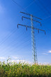 Foto: Power lines over blue sky Power lines over blue sky