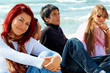 group of young friends on the beach