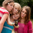 With four girls making a photo