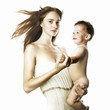 Beautiful young mom with naked baby