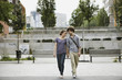 germany, berlin, young couple holding hands