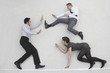 three business people fighting, elevated view