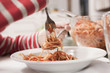 Photo: germany, cologne, child eating spaghetti, close-up germany, cologne, child eating spaghetti, close-up