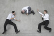 businessmen balancing on rope,playing with collegue