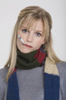young woman holding a clinical thermometer