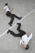 two businessmen in a hurry, elevated view