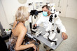 Doctor,examining a patient in ophthalmology laboratory