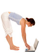 flexible young girl with laptop over white flexible young girl with laptop over white
