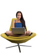 Young female sitting in the fashionable chair with laptop