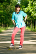 Teenage girl with skateboard
