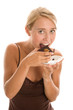 Woman eating chocolate cake Woman eating chocolate cake