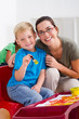 happy teacher with young student